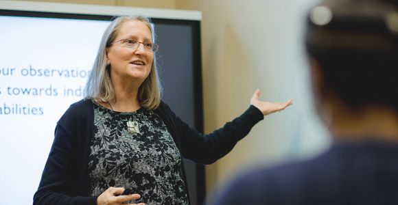 Portrait of MyPath Employee Rose presenting