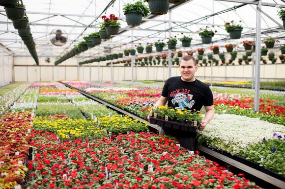 Student in the greenhouse